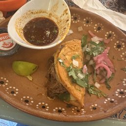 La Catrina Tacos & Tequila signature dishes Birria TacosQueso FundidoStreet CornCraft Margaritas